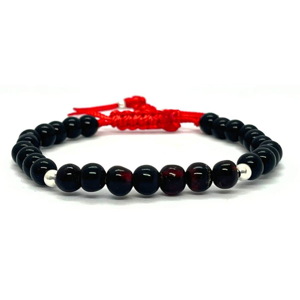 Red Amber and Black Onyx Bracelet with 7 Small Beads