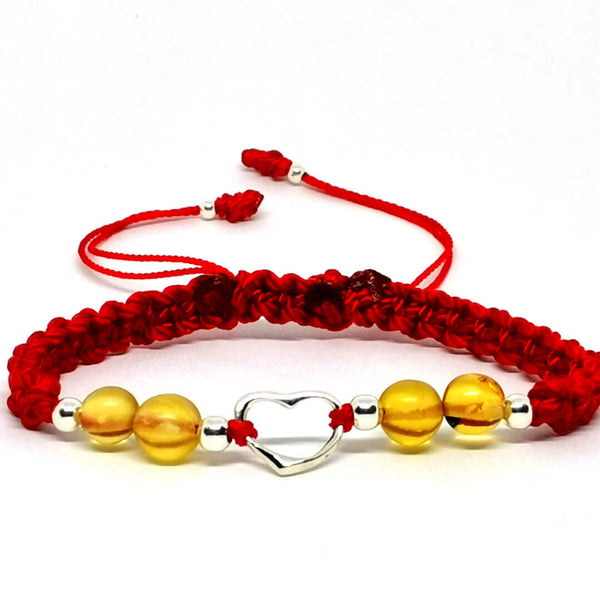 Amber Bracelet with Heart-Shaped Silver Charm